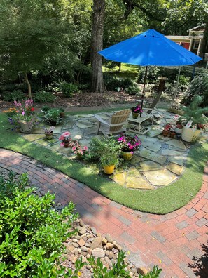 Cottage patio in full bloom 