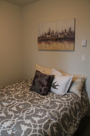 Queen bed in bedroom