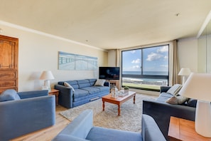 Couches face each other and pull-out into king beds. Room for 8 in living room.