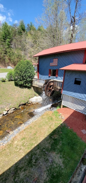 View of the water wheel from top porch