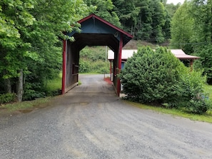 Entrance through covered bridge