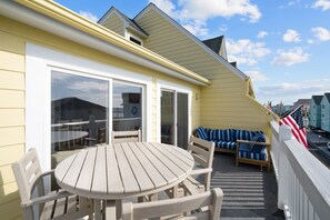 Have breakfast, lunch or dinner on the large deck and lounge on the couch 