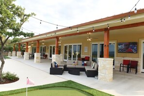 Watch your favorite TV show or the big game from the pool or the putting green 