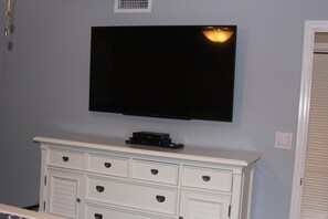 55' Smart Television in the Master Bedroom