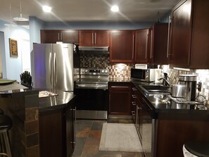 kitchen with island and two barstools 