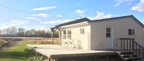 Furnished 1-bdrm cabin sleeps 2 – 4, on pristine 45-acre nature preserve.