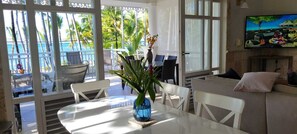 Dining area flowing nicely between living area and oversized terrace