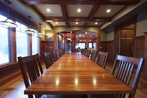 Extra long dining table has add on tables for extra large groups.