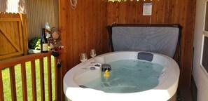 Sip some wine in your private 2 person hot tub Jacuzzi. 