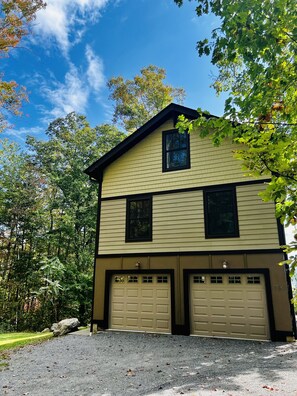 Right side of rental is the entrance, firepit, and yard. Garage is not for use. 