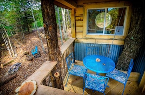 Right outside living room. You can see firepit below too!