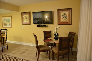 Living room with a 52" Flat Screen TV and DVD player