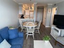 Living room with large screen tv with cable