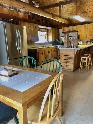 Open concept kitchen/dining room. 