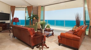 Living Room has Panoramic views of the Ocean. 11' Glass doors open all the way!