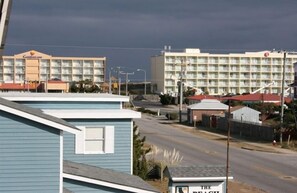 VIEW FROM THE MASTER BEDROOM BALCONY.  THESE HOTELS ARE OCEANFRONT.