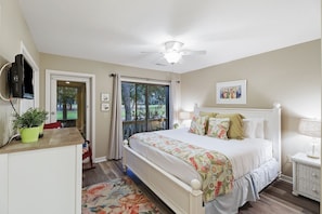 Sleep comfortably in the primary bedroom with a king bed, private bath, and flat screen TV.