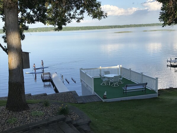 Beautiful view over looking the boathouse deck & lake.