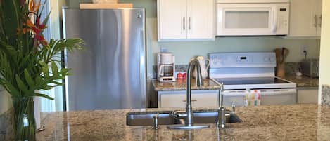 Remodeled kitchen with all new appliances, cabinets and granite counter tops