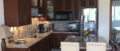 Gourmet kitchen with all new appliances and granite countertops.   