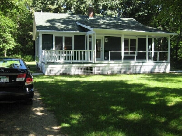 The property has a screened porch and firepit.