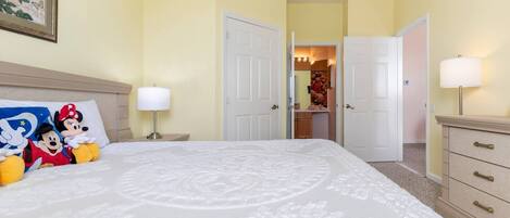 Master bedroom has a king bed and private door to full bathroom. Walk-in closet.