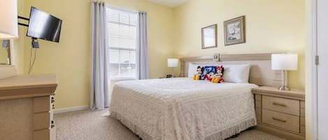 Master bedroom has a king bed and private door to full bathroom. Walk-in closet.
