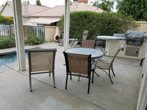 Gas BBQ and dining area