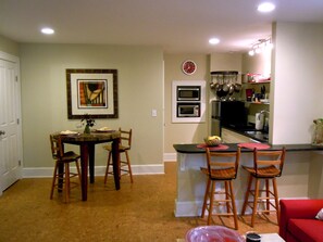 Granite counter seating and marble top dining table