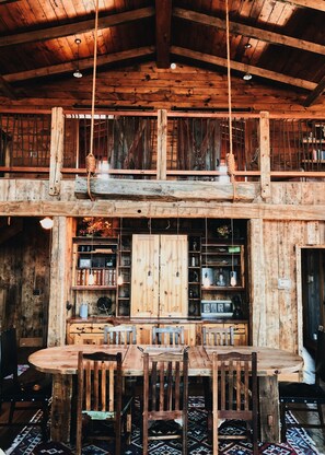 Dinner table, bar and loft view