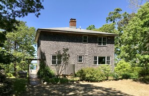 Entrance with accessible ramp, amazing lake & ocean views from front of house.