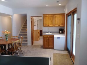 Small wet bar in dining area.