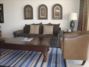 Living room - Pull out sofa bed & flat screen TV - opens to patio