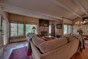 Massive couch with rustic decor