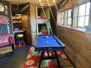 First floor bunk house with pool table overlooking patio; Mtn view
