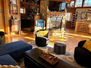 Gas fireplace, heated radiant floors throughout and TONS of sunlight= COZY space