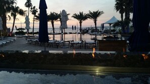 Romance under the stars with view of Sound at Fire pit located infinity poolside