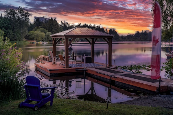 Dock and Gazebo in morning sunrise, quiet calm lake.  Good for swimming.