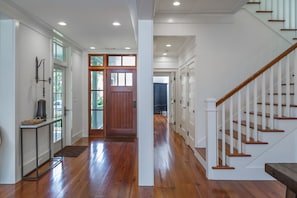 Front Door and Hallway to Downstairs Master