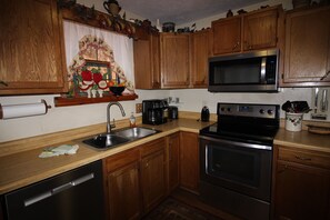 Kitchen which includes utensils