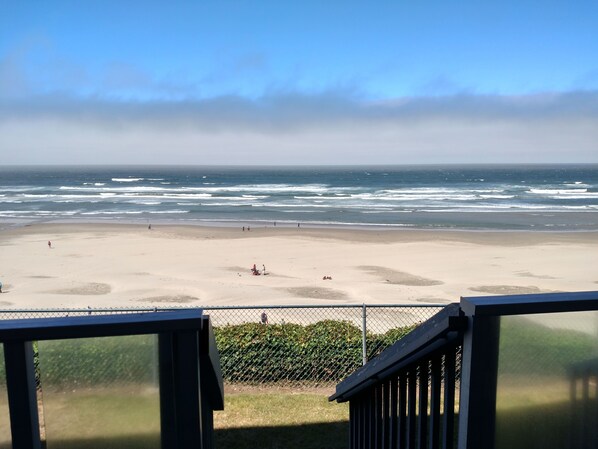 View from picture window through clear railings