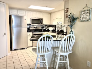 Well equipped kitchen that is kept stocked so you can cook if you wish.