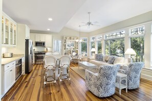 Kitchen with seating area and TV.