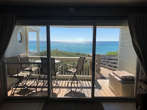 Gulf view from the inside living space. Direct boardwalk access to beach.