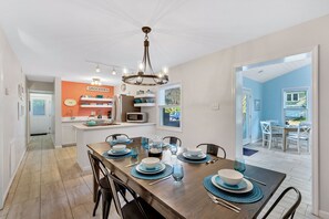 Dining Area Between Kitchen and Living Space