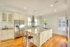 Our kitchen is every chef's dream! The kitchen is the new family room, and there's plenty of room to hang out and prepare a great meal.