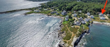 Peabbles Point has a charming path for walks along the ocean