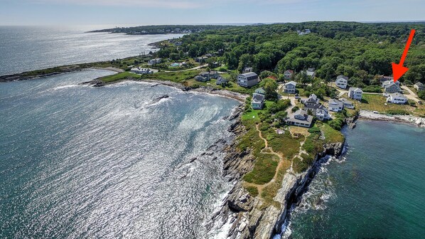 Peabbles Point has a charming path for walks along the ocean