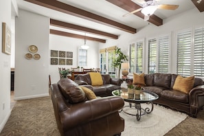 Open concept living room, and dining room.