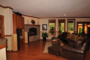 Living room with large screen TV, surround sound & DirecTV